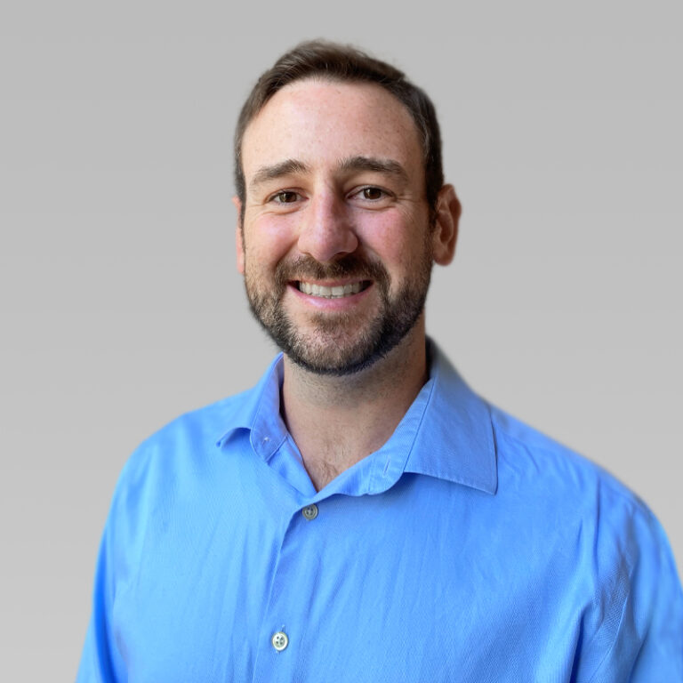 PCA Employee Dave Arquette on a grey background