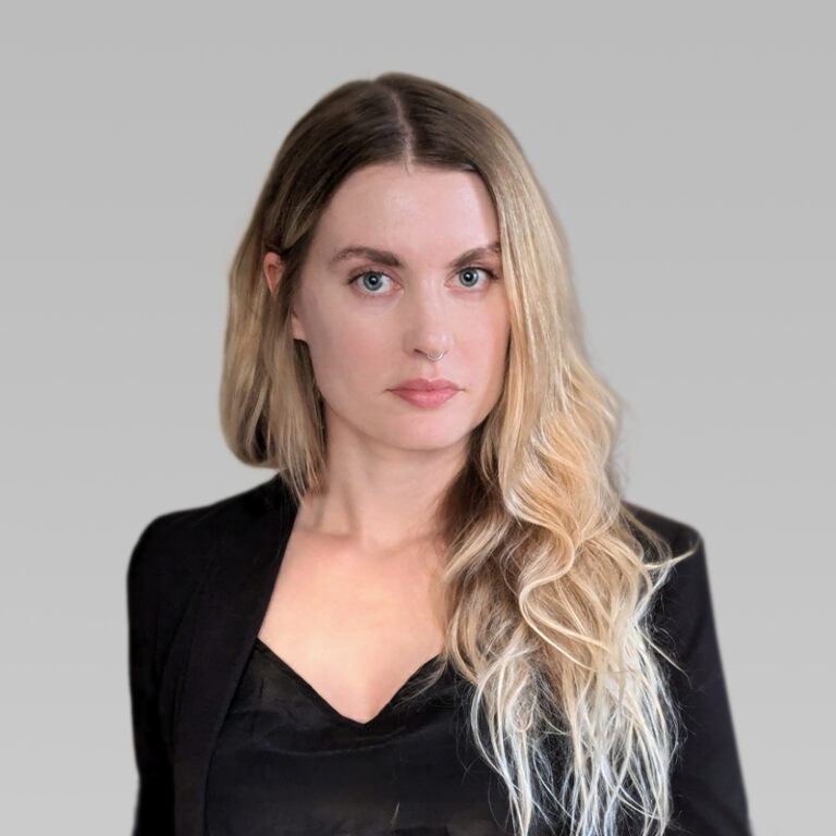 PCA Employee Kaitlin Beer headshot on a grey background