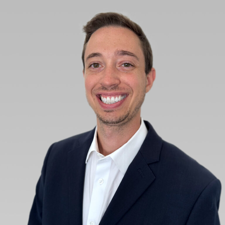 PCA Employee Trevor Storck on a grey background